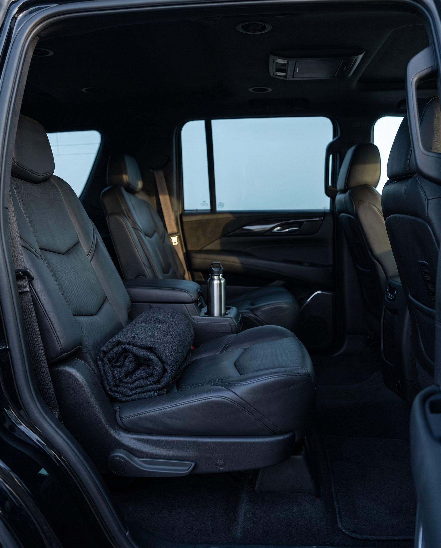 The quiet, warm interior of a LuxeRide chauffeured vehicle